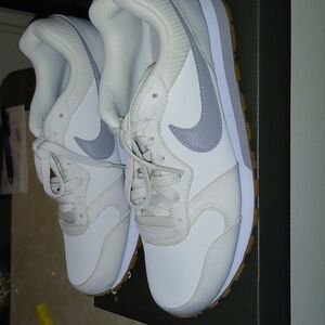 Female sneakers.Leather.